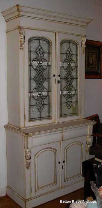 Two Piece Contemporary Hutch, there are some breaks in glass at front doors...