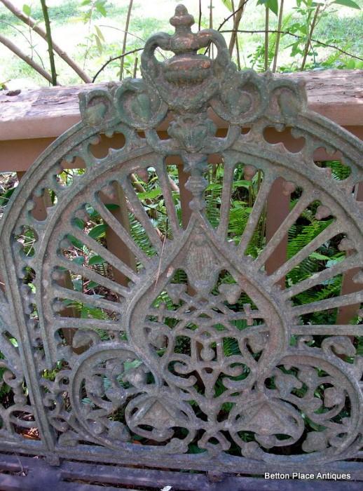 close up of center back of the antique cast iron Bench