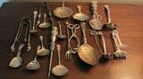 Large unusual assortment of Sterling Silver serving pieces.