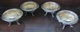 Set of four Sterling Silver footed large salt cellars.