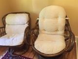 Two bamboo swivel chairs