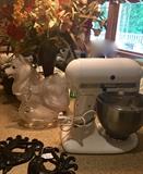 Kitchen Aid Mixer with an nice assortment of kitchen and decorative items