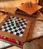 Two asian chess sets with intricate detail and artistry