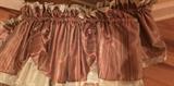 Various sets of curtains and valances