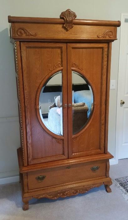 Entertainment Center by Lexington--oak with great mirrored doors