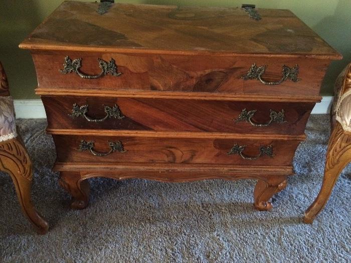 Gorgeous vintage chest.  The top opens up and the backside looks like books
