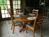 Oak Table and Chairs with extra extentions