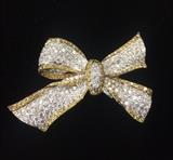 One of a kind custom made 14K gold pin with white & yellow pave diamonds. Over 10 carts of diamonds. Appraised at $31,000. 