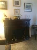 Electric fireplace, brass planter, prints, birds, crystal vase and candle holders