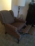 Reclining armchair, tall etched brass lamp