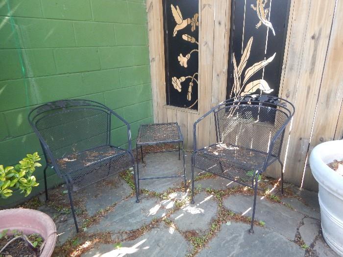garden set of chairs with accent table.