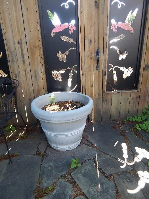 large outdoor flower pot.