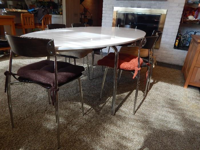 Wood and chrome Italian chairs and table.
