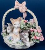 Lot #8, Retired Lladro Privilege Figurine "Purr-fect" Cat
Delightful Lladro hard-paste porcelain figurine, "Purr-fect", No. 1444. This statuette was designed by Juan Huerta, released in 1983 and retired in 2005. It depicts 3 kittens who are resting in a basket of flowers. The bottom is stamped with the blue Lladro bellflower hallmark and DAISA 1984. Excellent condition. Measures 5.5" tall. Tag Words: Spain, Intdes, cat, feline, kitty, pet