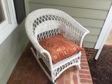 white wicker rocker