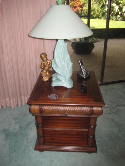 Two Tommy Bahama looking end tables with matching coffee table.