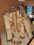 Bags of old golf clubs