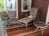 Patio furniture on a three season porch ... with great indoor-outdoor rug