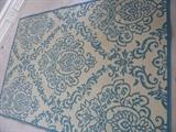 Blue and cream area rug