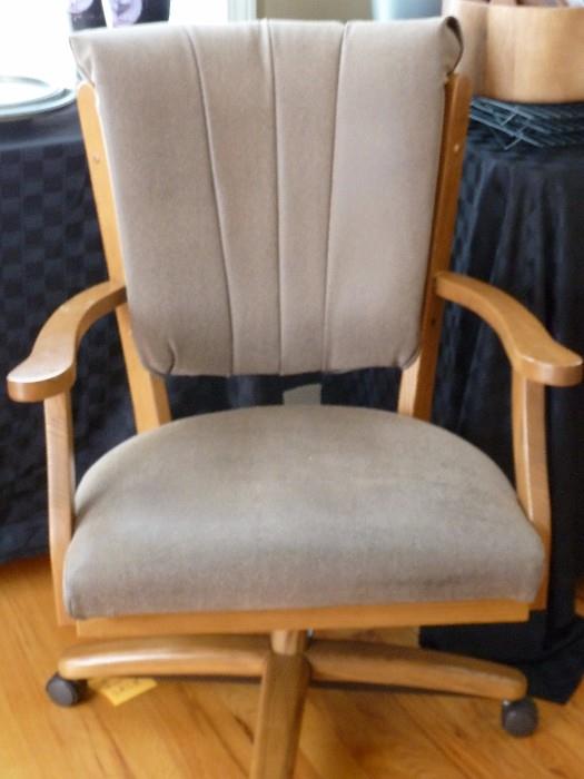 Pair of light bomber leather swivel chairs on castors