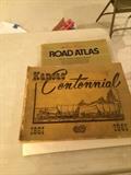 old atlas and book about Kansas Centennial