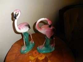 Flamingo's..One is fine..the one on the right is damaged