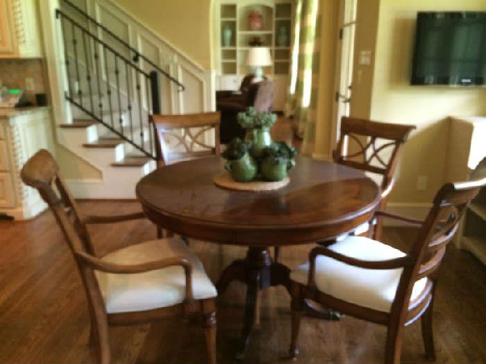 round breakfast table with 4 arm chairs 750.00