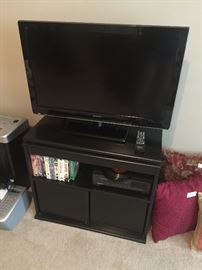 Flat screen Panasonic TV and stand