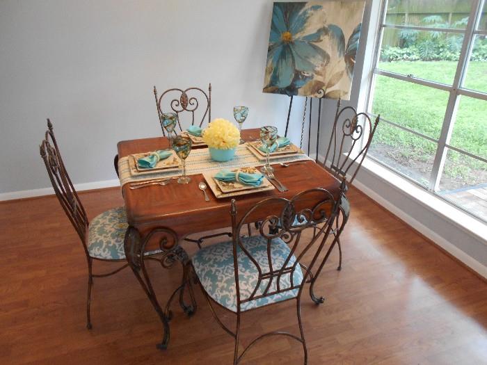 very nice wood and iron dinette set