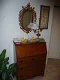 Drop front desk, milk glass student lamp, gilded mirror