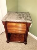 Marble roll top table
