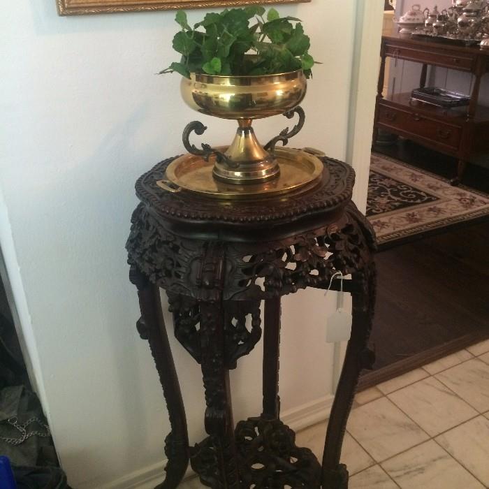 Intricately carved antique plant stand