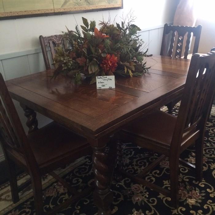 Exceptional barley twist antique table with 6 matching chairs 