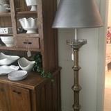 One of two large matching floor lamps