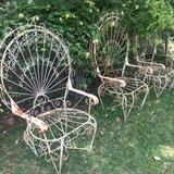 Three of four "peacock" chairs 