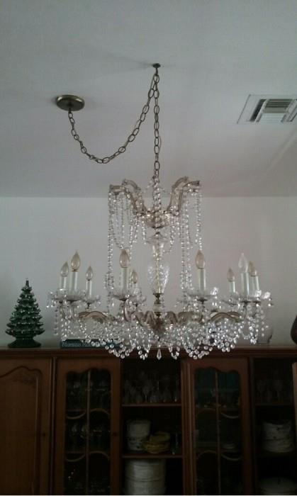 We have a gorgeous 12 arm Waterford chandelier just dripping with prisms!