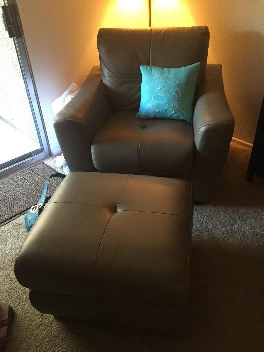 Bad picture of a good chair.  New Leather lazy boy club chair with storage bin ottoman.