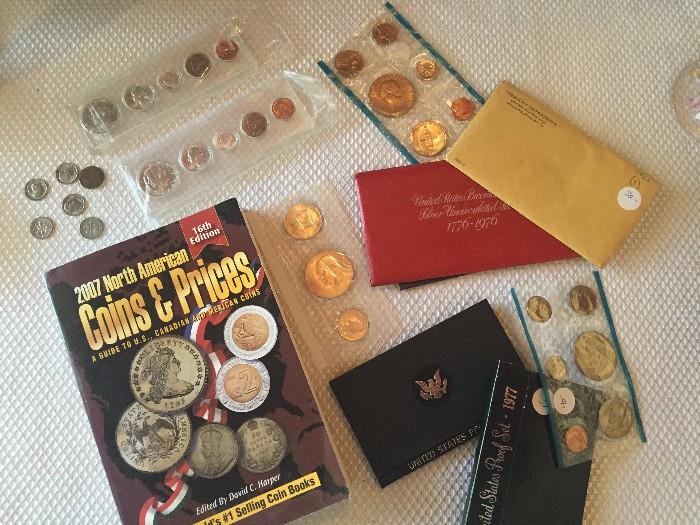 Many mint old coin sets.