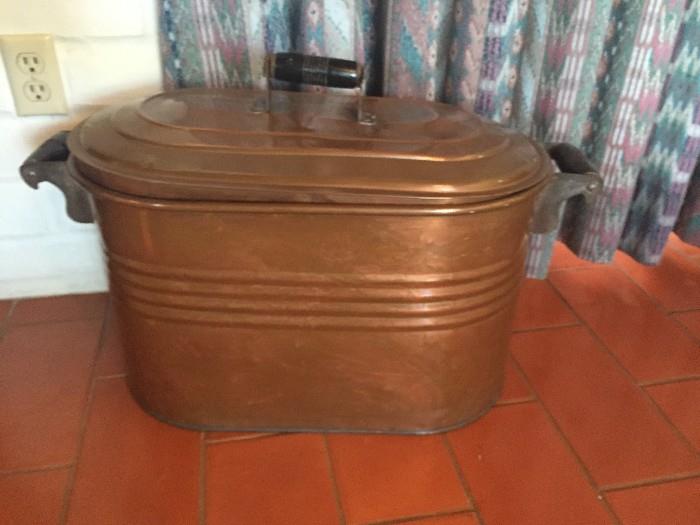 Take home an antique copper boiler in excellent condition.