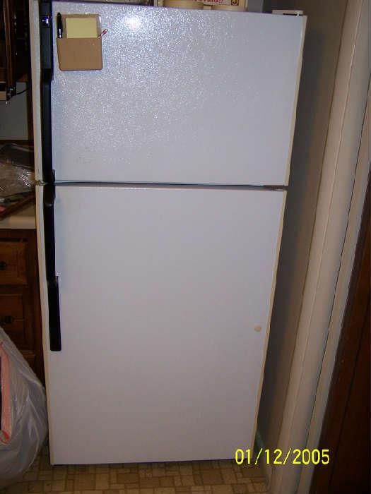 Refrigerator upstairs, another one downstairs and 1 chest style Freezer downstairs 