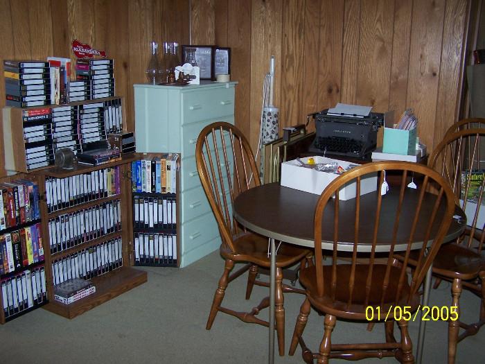 Tape Cabinet, Round Card Fold up Table, 4 nice matching Chairs, 5 drawer Chest,  Sewing Machine in cabinet, behind the table , Craft Items, good assortment of 8 track Tapes  - Upstairs items 