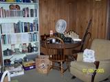Rocker, more Chairs, Round Pedestal Base Table, over 100 of Louis Lamour Paperbacks, Vision Ware, vintage Pots and Pans, great selection of Books, and so much more - Upstairs items