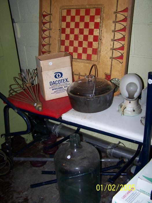 on floor, large Glass Jar, on table - Cast Iron pot w/Handle & glass Lid, old Light Fixture  - Downstairs items