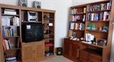 Two bookcases over cabinets, oak media cabinet. Books!
