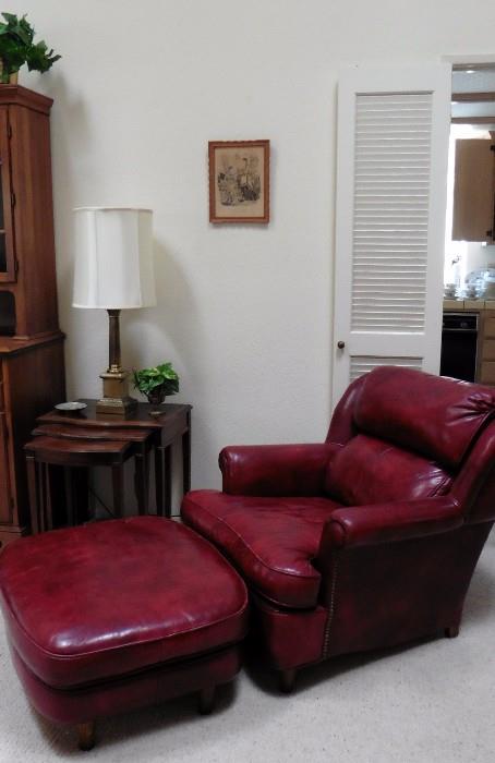 "Classic Furniture" deep red leather chair with ottoman. Nest of 3 mahogany tables.