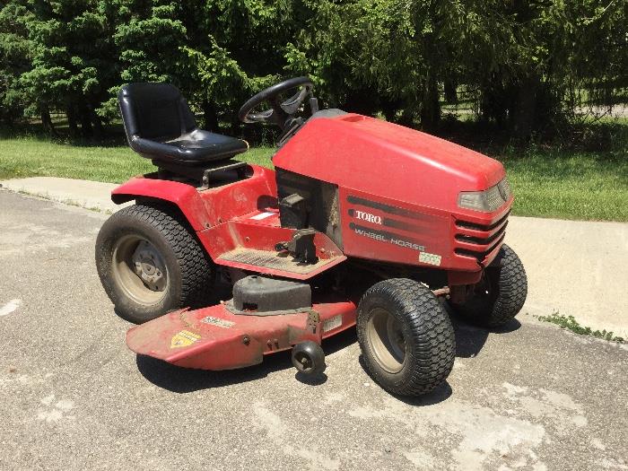 Toro riding lawn mower with snowblower attachment. $900.00