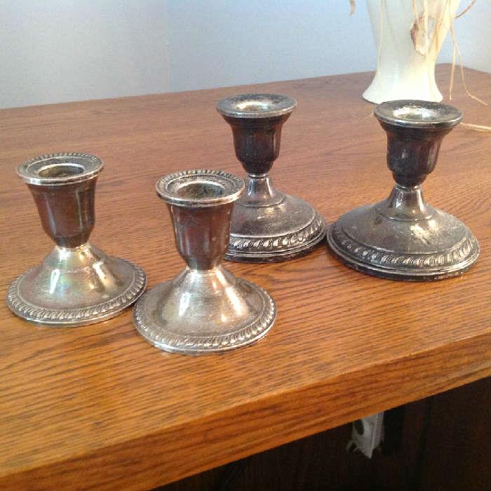Sterling Silver Weighted Candle Holders - $ 20.00 for each pair.