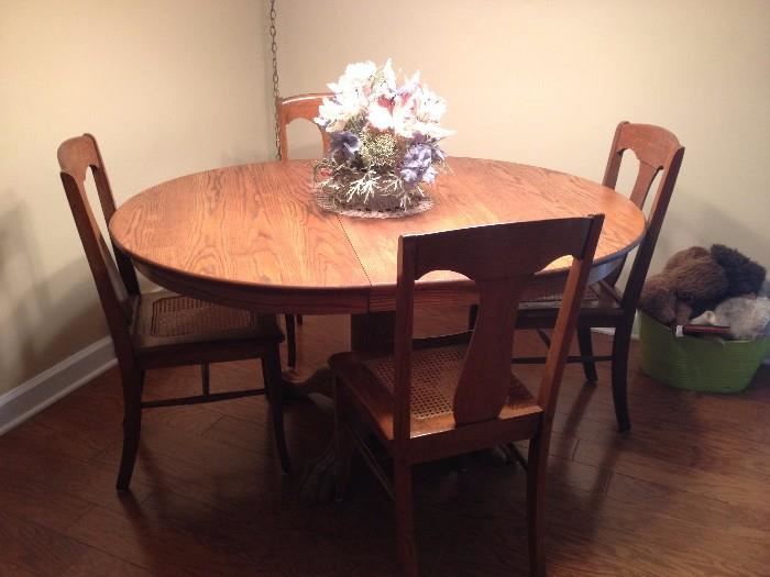 oak dining set w/ 6 chairs (4 shown), and 2 leaves