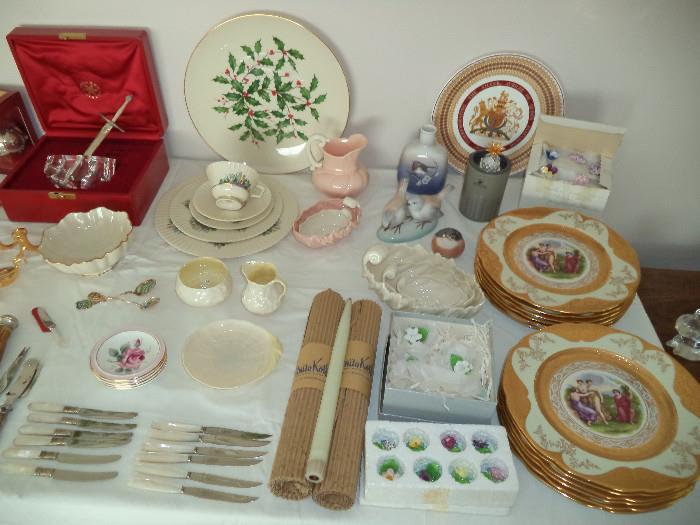 gold plated dinnerware, porcelain place cards, butane candles, Lenox, Belleek, mother of pearl handle knives, Steuben excalibur