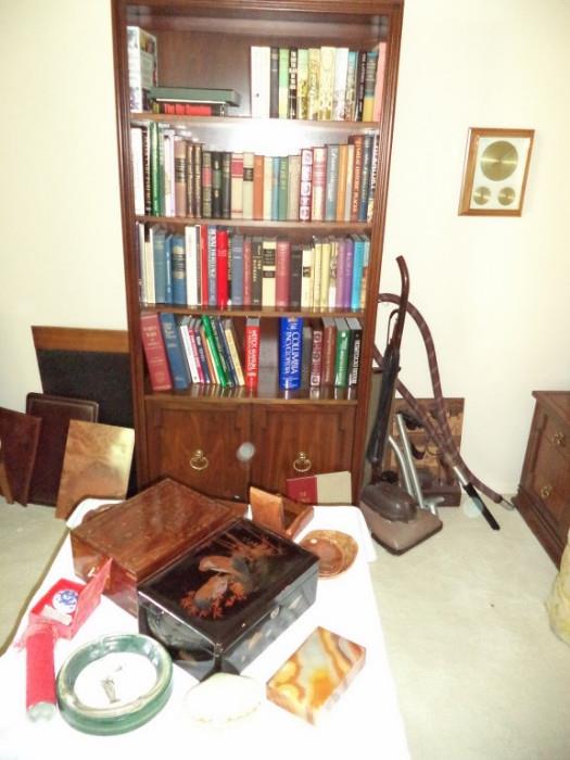 bookcase, books, jewelry boxes, vintage sweeper
